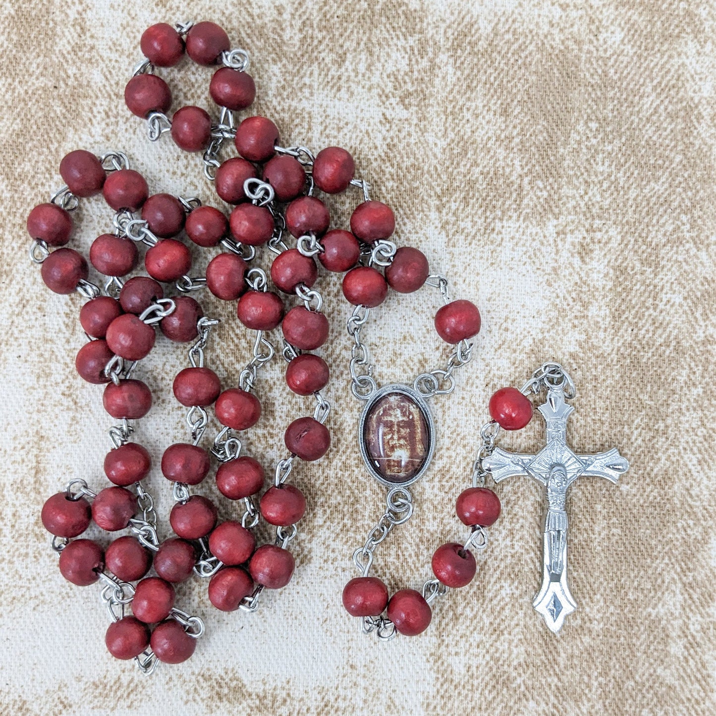 Rosewood rosary and Holy Face image